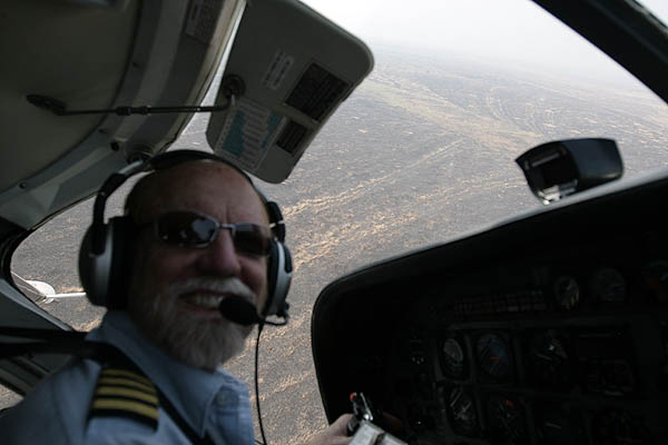 John, pilot extraordinaire, banking left to see some elephants